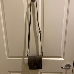 Distressed cross body purse